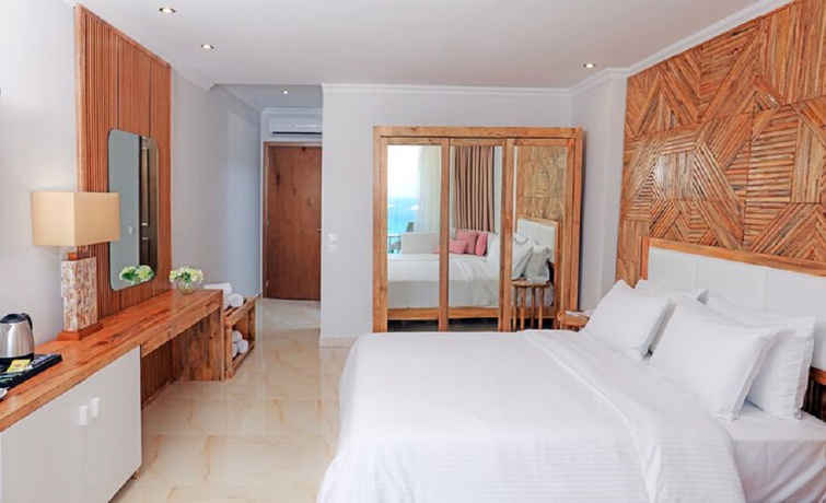 Imagen de la habitación del Hotel Mythos Palace. Foto 5