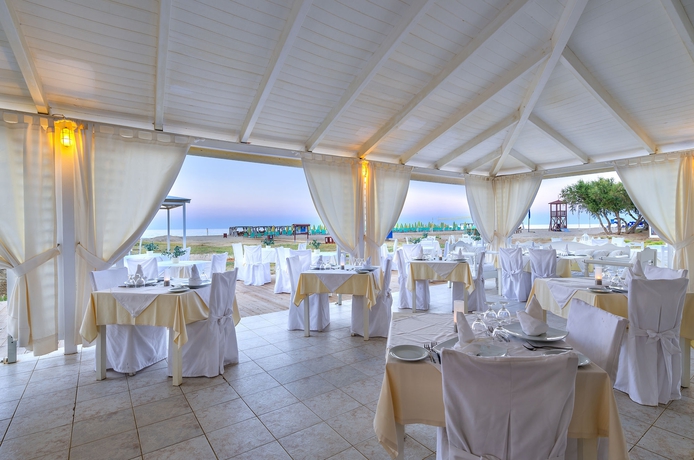 Imagen del bar/restaurante del Hotel Mythos Palace Resort and Spa - All Inclusive. Foto 3