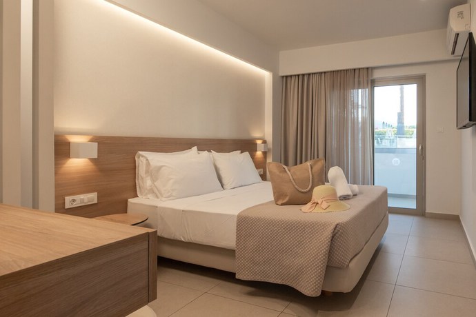 Imagen de la habitación del Hotel Mythos Suites. Foto 13