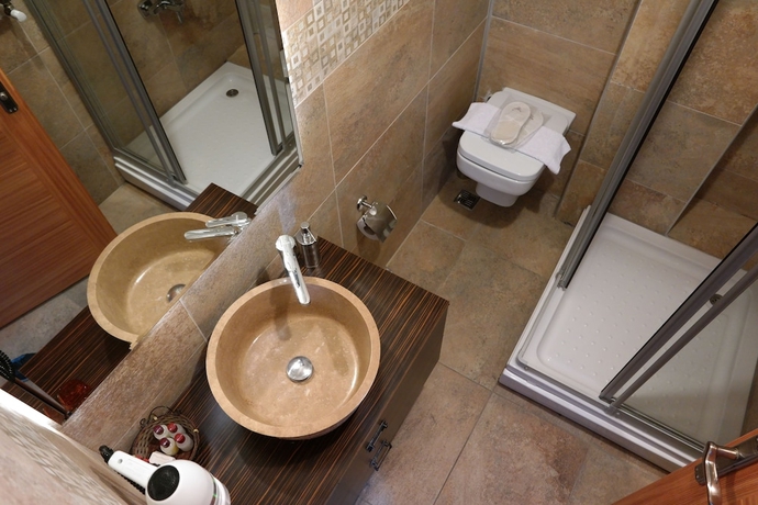 Imagen de la habitación del Hotel Mytra. Foto 16