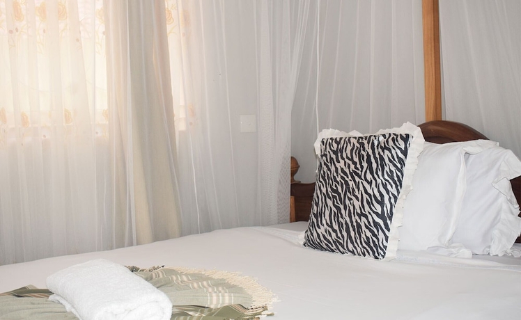 Imagen de la habitación del Hotel Mzunguu Safari Lodge. Foto 7