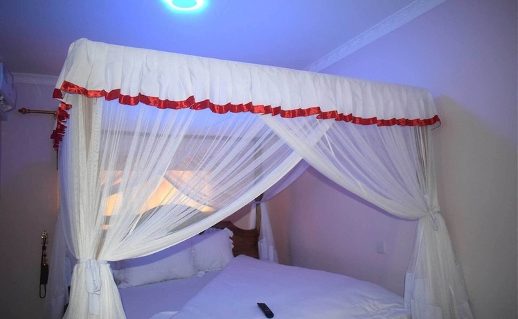 Imagen de la habitación del Hotel Mzunguu Safari Lodge. Foto 8