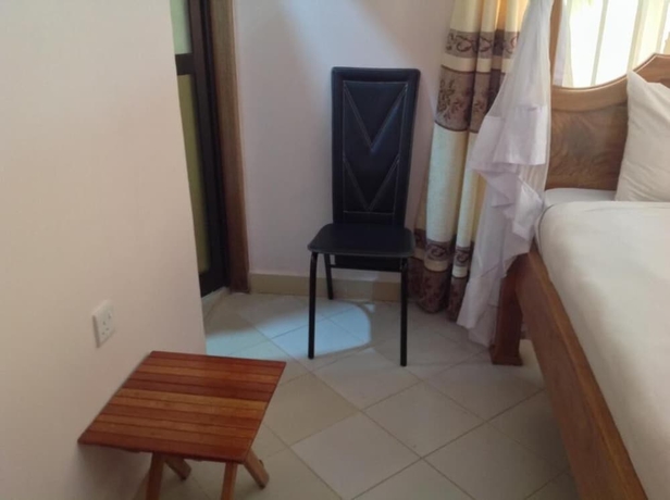 Imagen de la habitación del Hotel Mzunguu Safari Lodge. Foto 11