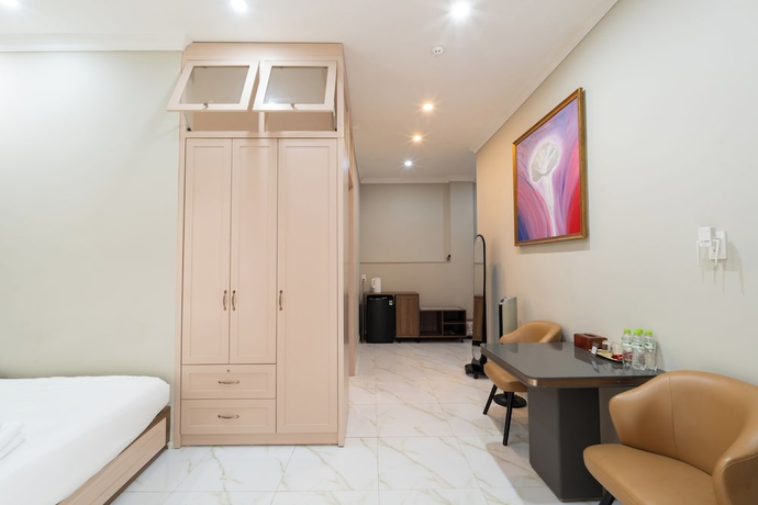 Imagen de la habitación del Hotel N Queen Apartment. Foto 12