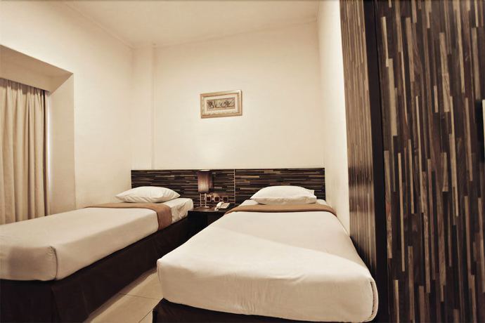 Imagen de la habitación del Hotel N2 Gunung Sahari. Foto 2
