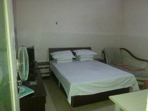 Imagen de la habitación del Hotel N9 Express Inn. Foto 2