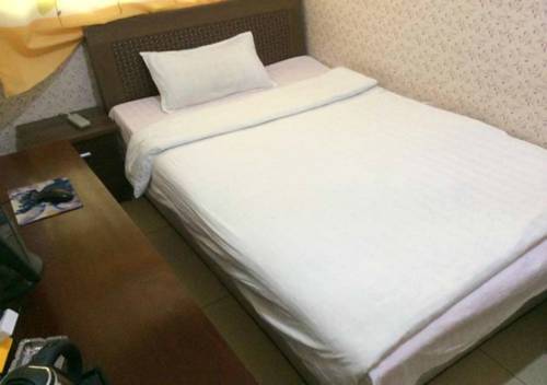 Imagen de la habitación del Hotel N9 Express Inn. Foto 4