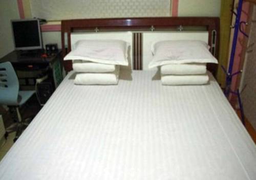 Imagen de la habitación del Hotel N9 Express Inn. Foto 5