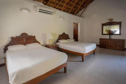 Imagen de la habitación del Hotel NA BALAM SUITES BEACH HOTEL. Foto 6