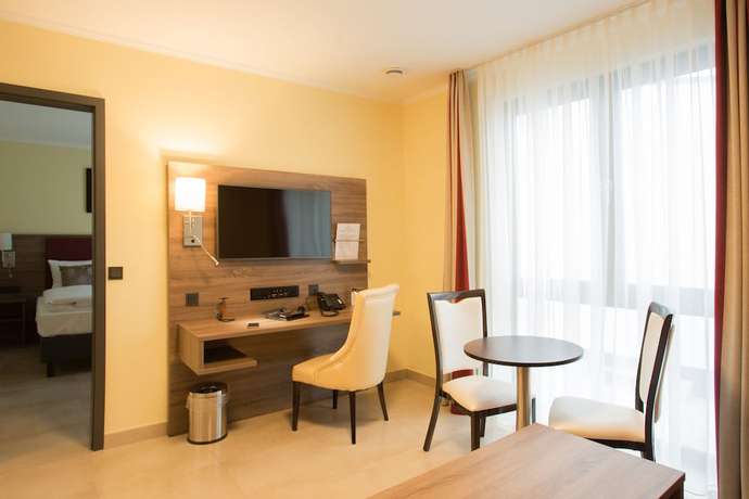 Imagen de la habitación del Hotel NAAM and Apartments Frankfurt. Foto 11