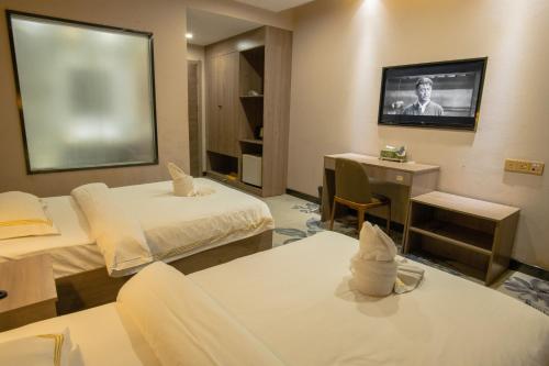 Imagen general del Hotel 阳光酒店（金边皇宫NAGA娱乐场店）. Foto 10