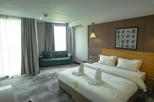 Imagen de la habitación del Hotel 阳光酒店（金边皇宫NAGA娱乐场店）. Foto 20