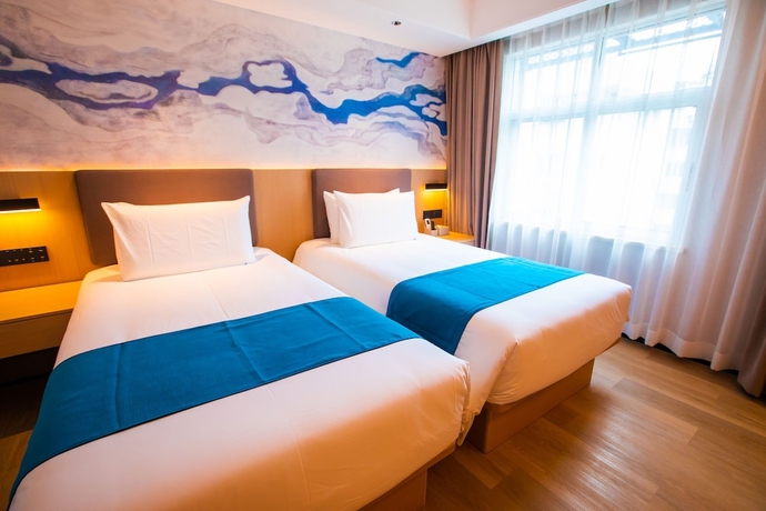 Imagen de la habitación del Hotel NAIVE L Executive Apartments Coast City. Foto 15