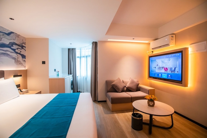 Imagen de la habitación del Hotel NAIVE L Executive Apartments Coast City. Foto 16