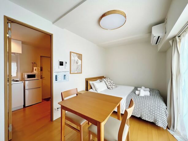 Imagen de la habitación del Hotel NALY. TENMA AFP Apartment. Foto 17