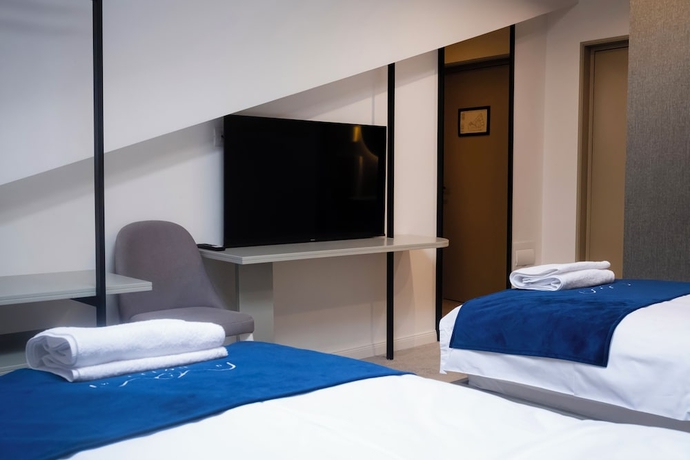 Imagen de la habitación del Hotel NAM HOTEL. Foto 5
