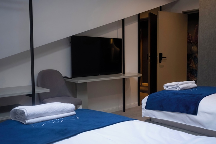 Imagen de la habitación del Hotel NAM HOTEL. Foto 9