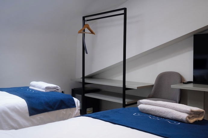 Imagen de la habitación del Hotel NAM HOTEL. Foto 10