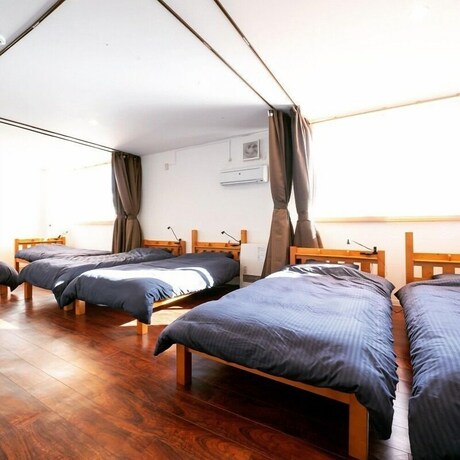 Imagen de la habitación del Hotel NANDA HOUSE. Foto 4