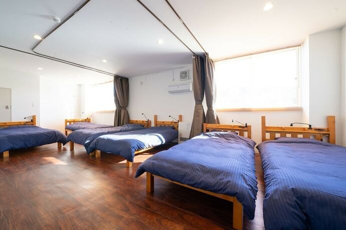 Imagen de la habitación del Hotel NANDA HOUSE. Foto 12