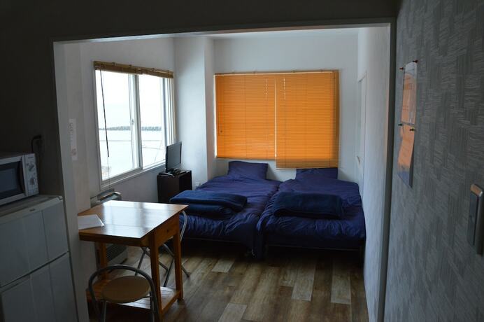 Imagen de la habitación del Hotel NANDA HOUSE. Foto 14