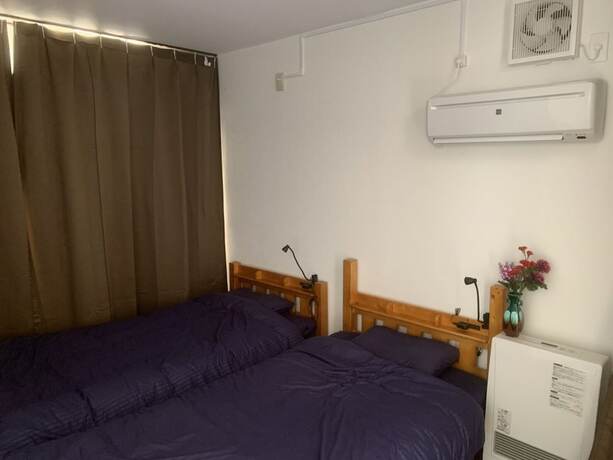 Imagen de la habitación del Hotel NANDA HOUSE. Foto 16