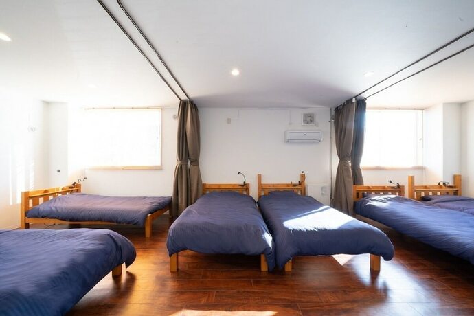 Imagen de la habitación del Hotel NANDA HOUSE. Foto 20