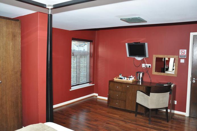 Imagen de la habitación del Hotel NAP INN. Foto 7