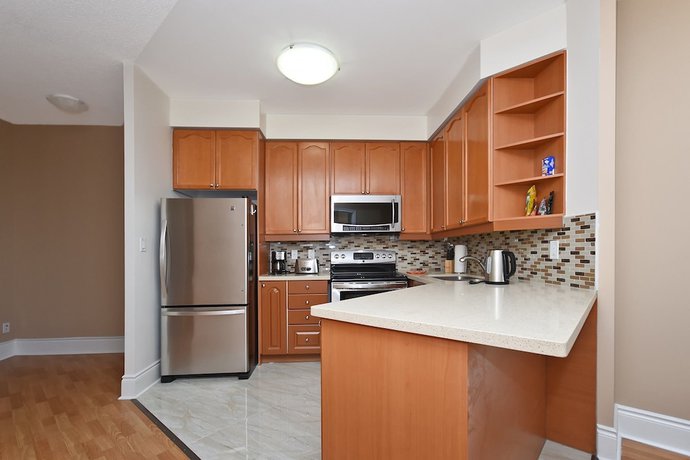 Imagen de la habitación del Hotel NAPA Furnished Suites Square One. Foto 5
