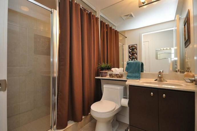 Imagen de la habitación del Hotel NAPA Furnished Suites Square One. Foto 11