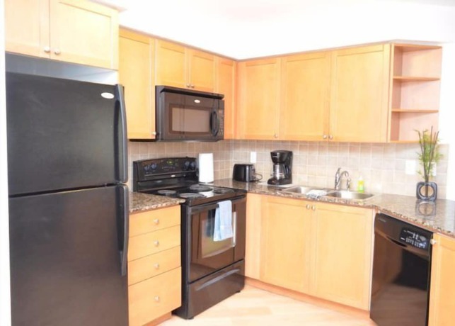 Imagen de la habitación del Hotel NAPA Furnished Suites Square One. Foto 18