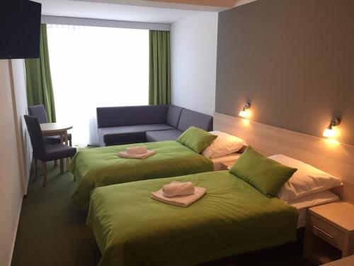Imagen de la habitación del Hotel *** NAT Krynica Morska. Foto 18