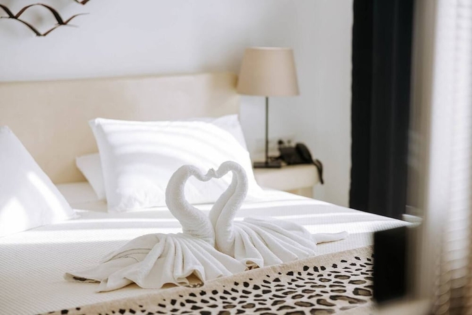 Imagen de la habitación del Hotel NAXIAN EMERALD HOTEL. Foto 4