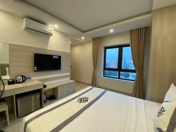 Imagen de la habitación del Hotel NB Hoang Gia 1 Hotel. Foto 18