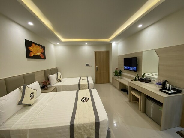 Imagen de la habitación del Hotel NB Hoang Gia 1 Hotel. Foto 36