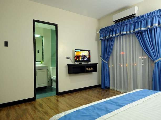 Imagen de la habitación del Hotel NDN Grand Hotel. Foto 15