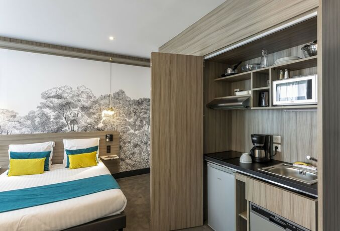 Imagen de la habitación del Hotel NEMEA Appart Paris Levallois. Foto 16