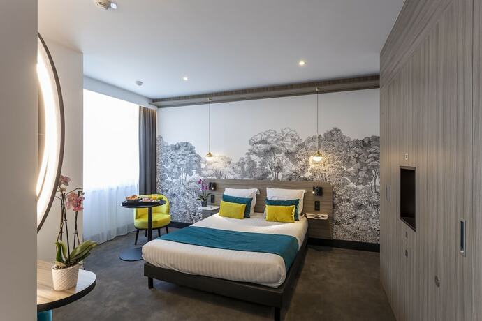 Imagen de la habitación del Hotel NEMEA Appart Paris Levallois. Foto 17