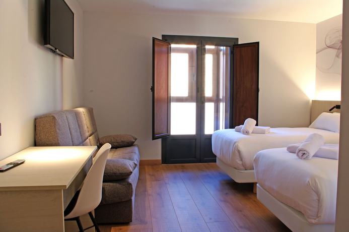 Imagen de la habitación del Hotel NERU con encanto. Foto 15