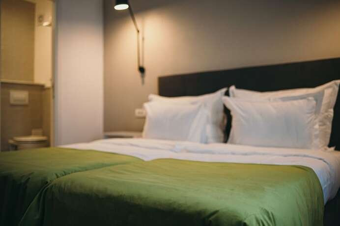 Imagen de la habitación del Hotel NEST Guesthouse. Foto 16