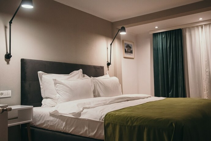 Imagen de la habitación del Hotel NEST Guesthouse. Foto 19