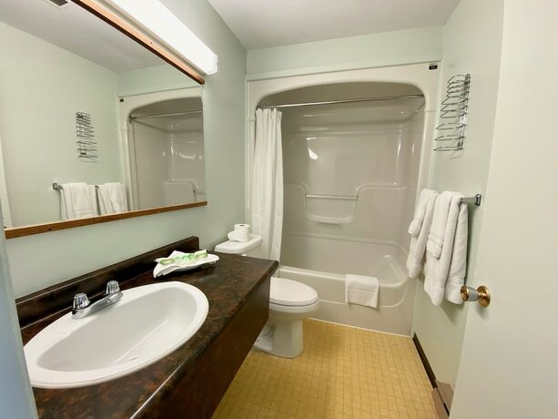 Imagen de la habitación del Hotel NEW AGE MOTEL INN. Foto 15
