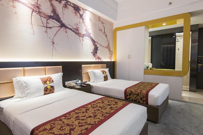 Imagen de la habitación del Hotel NEW BEACON INTERNATIONAL HOTEL WUHAN JINYINHU SUBW. Foto 3