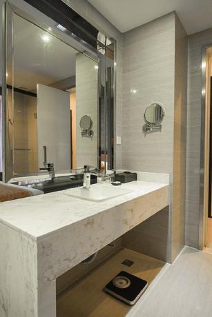 Imagen de la habitación del Hotel NEW BEACON INTERNATIONAL HOTEL WUHAN JINYINHU SUBW. Foto 4