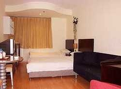 Imagen de la habitación del Hotel NEW CENTURY SERVICE APARTMENT. Foto 2