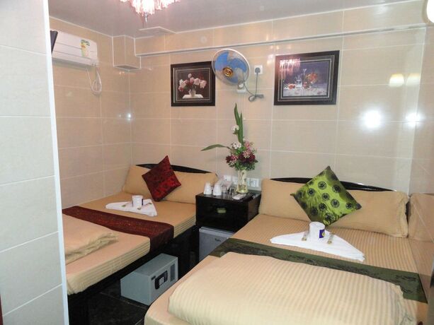 Imagen de la habitación del Hotel NEW DAY NIGHT HOSTEL. Foto 16