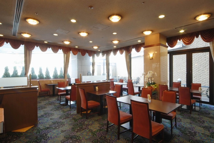 Imagen del bar/restaurante del Hotel NEW HIRODEN. Foto 3