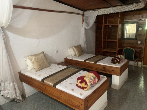 Imagen de la habitación del Hotel NEW PAMOJA RESORT. Foto 9