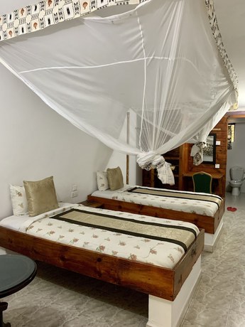 Imagen de la habitación del Hotel NEW PAMOJA RESORT. Foto 10