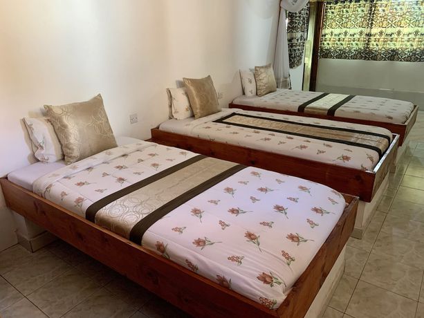 Imagen de la habitación del Hotel NEW PAMOJA RESORT. Foto 12